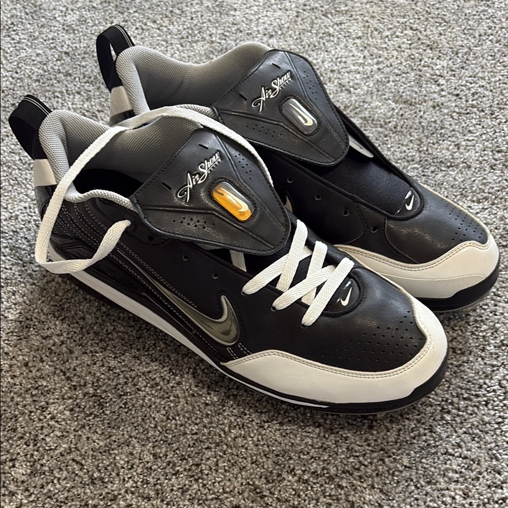 Nike Black and White Metal cleats with Mid-Top Design - size 13